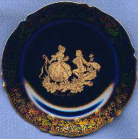 small limoges porcelain plate with gilt picture of lovers