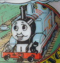 cup 1: closeup of blue train with face