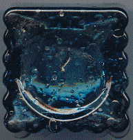 aqua glass victorian ink bottle with original broken-off neck and many many bubbles: back view