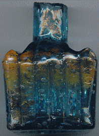 aqua glass victorian ink bottle with original broken-off neck and many many bubbles: right view