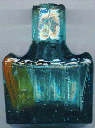 victorian pale green glass ink bottle with a few bubbles and attractive ink stains: right view