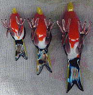 three bright glass birds, view from below