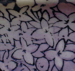 handpainted transfer of lilac flowers on rim of shard