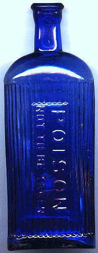 blue poison bottle: front view