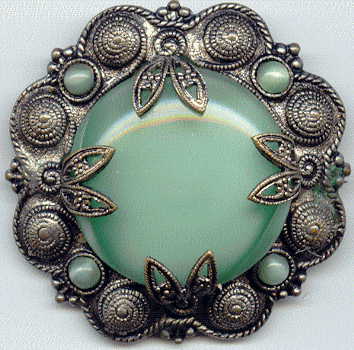 1940s? brooch with green satin glass cabochons