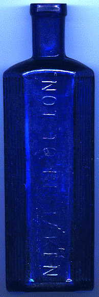 medium-large bristol blue victorian poison bottle. it says: NOT TO BE TAKEN