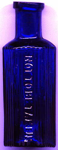 small bristol blue hexagonal victorian ntbt poison bottle: front view